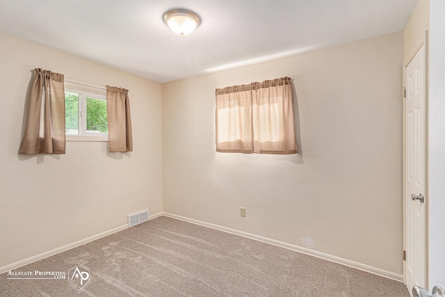1006 Southlawn Ave, Flint, MI 48507 - unfurnished bedroom with carpet and baseboards