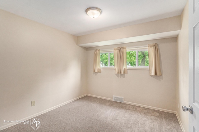 1006 Southlawn Ave, Flint, MI 48507 - empty room featuring carpet flooring and baseboards