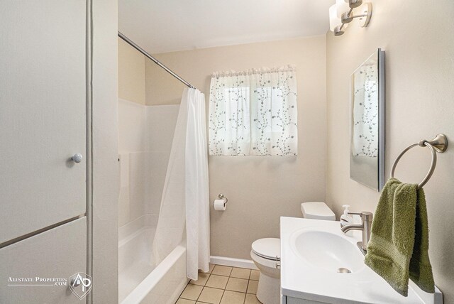 1006 Southlawn Ave, Flint, MI 48507 - bathroom with tile patterned floors, vanity, and shower / tub combo