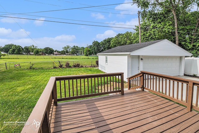 1006 Southlawn Ave, Flint, MI 48507 - wooden deck featuring a detached garage, an outbuilding, and view of scattered trees