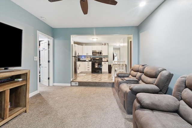 759 Elm St, Allenton, MI 48002 - living room featuring ceiling fan and light carpet