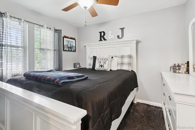 759 Elm St, Allenton, MI 48002 - bedroom featuring dark carpet and a ceiling fan