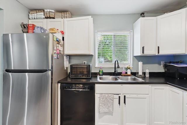 759 Elm St, Allenton, MI 48002 - kitchen featuring freestanding refrigerator, black dishwasher, dark countertops, and white cabinetry