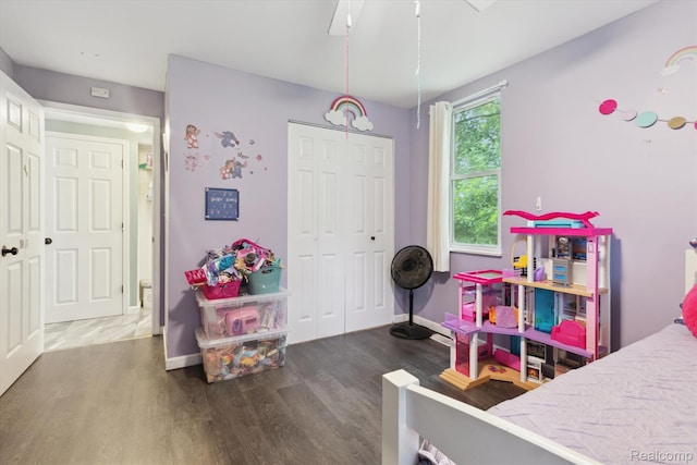 759 Elm St, Allenton, MI 48002 - bedroom featuring wood finished floors, a closet, and a ceiling fan