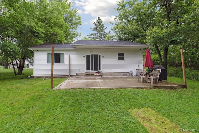 759 Elm St, Allenton, MI 48002 - back of house with a patio area, a lawn, and entry steps