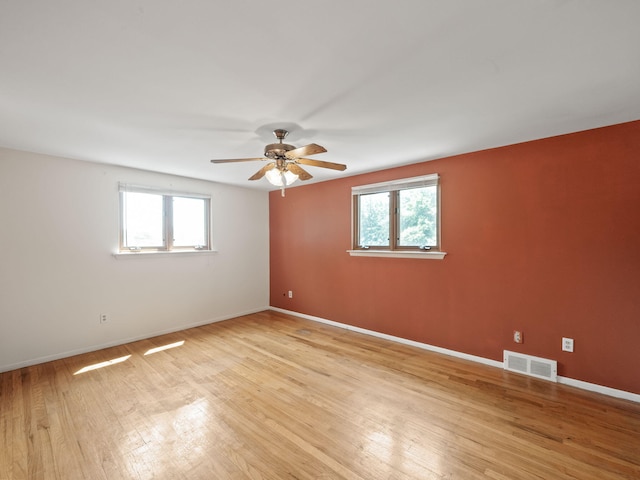 3640 Pall Dr, Warren, MI 48092 - unfurnished room featuring light wood-style flooring and a ceiling fan