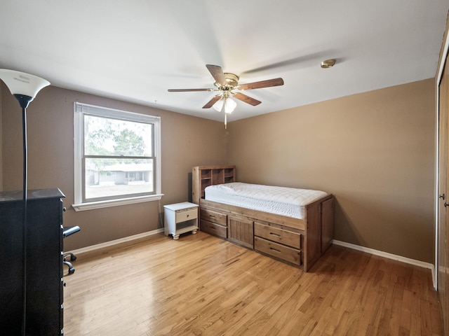 3640 Pall Dr, Warren, MI 48092 - bedroom with light wood-style floors and a ceiling fan
