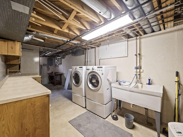 3640 Pall Dr, Warren, MI 48092 - washroom featuring independent washer and dryer and a textured wall