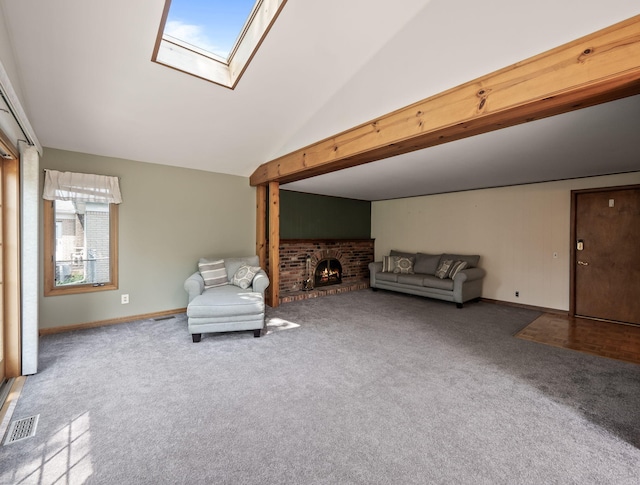 3640 Pall Dr, Warren, MI 48092 - living area featuring carpet floors, a skylight, a brick fireplace, and vaulted ceiling