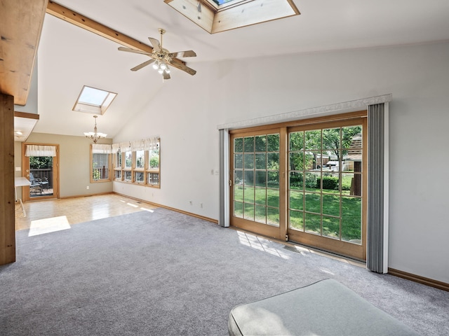 3640 Pall Dr, Warren, MI 48092 - unfurnished living room with a skylight, carpet floors, plenty of natural light, and high vaulted ceiling