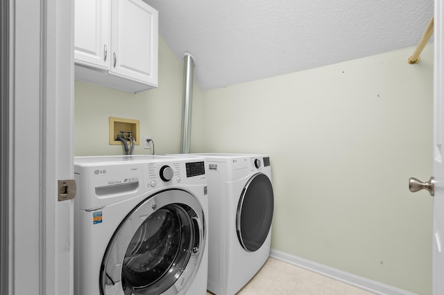 220 Deer Path Ln, Battle Creek, MI 49015 - washroom with cabinet space, washer and clothes dryer, and a textured ceiling