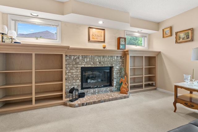 220 Deer Path Ln, Battle Creek, MI 49015 - living room with carpet flooring, a brick fireplace, and recessed lighting
