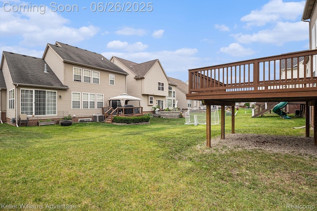 27455 Harrington Way, Novi, MI 48374 - view of green lawn featuring a deck, a gazebo, and a residential view