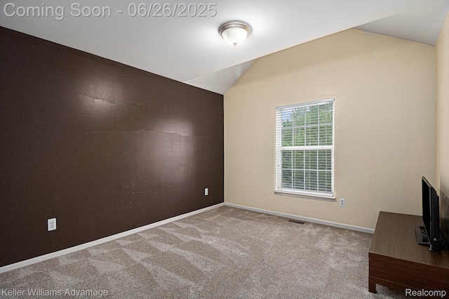 27455 Harrington Way, Novi, MI 48374 - carpeted empty room with vaulted ceiling and baseboards