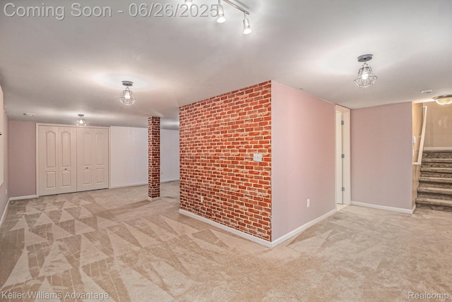 27455 Harrington Way, Novi, MI 48374 - finished basement with carpet flooring, stairway, and brick wall