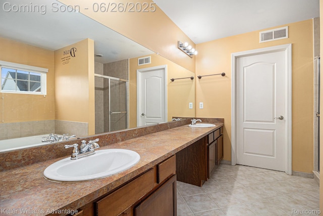 27455 Harrington Way, Novi, MI 48374 - bathroom with double vanity, a stall shower, tile patterned floors, and a bath