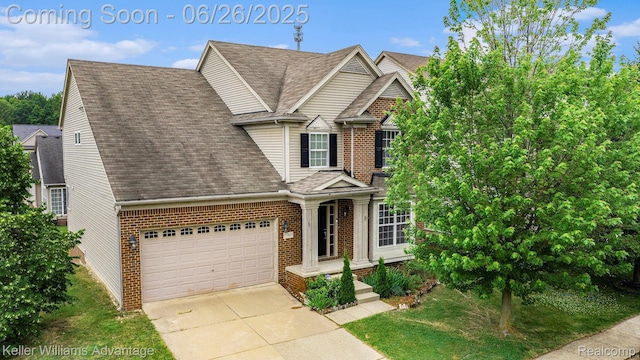 27455 Harrington Way, Novi, MI 48374 - traditional-style home with a garage, brick siding, a shingled roof, and driveway