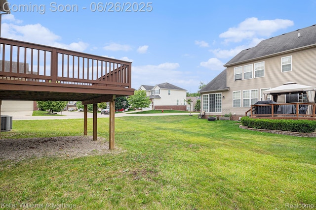 27455 Harrington Way, Novi, MI 48374 - view of grassy yard with a gazebo and a wooden deck