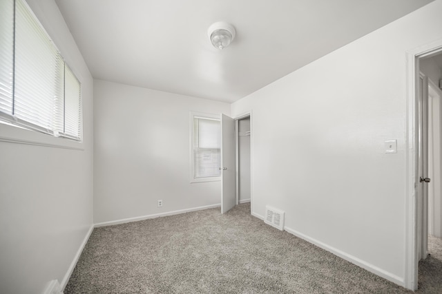 470 Fildew Ave, Pontiac, MI 48341 - unfurnished bedroom with carpet flooring and baseboards