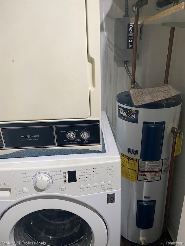 29900 N Grand Oaks Dr Unit 26, Warren, MI 48092 - laundry room featuring water heater and stacked washing machine and dryer