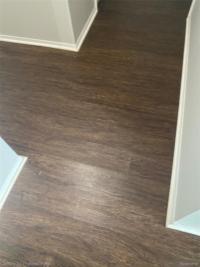 29900 N Grand Oaks Dr Unit 26, Warren, MI 48092 - detailed view of wood finished floors and baseboards