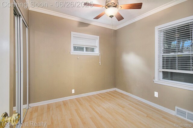 525 Marlin Ave, Royal Oak, MI 48067 - unfurnished room featuring light wood finished floors, crown molding, and a ceiling fan