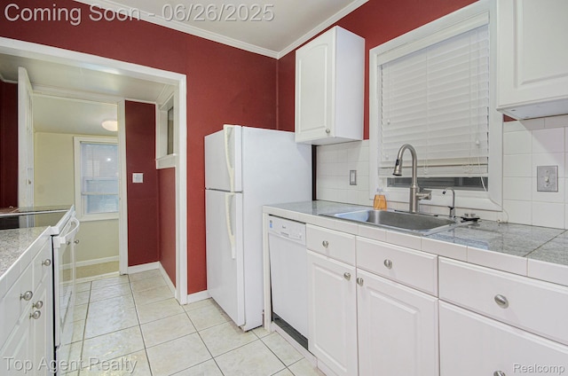525 Marlin Ave, Royal Oak, MI 48067 - kitchen featuring white appliances, tasteful backsplash, white cabinetry, light tile patterned flooring, and ornamental molding