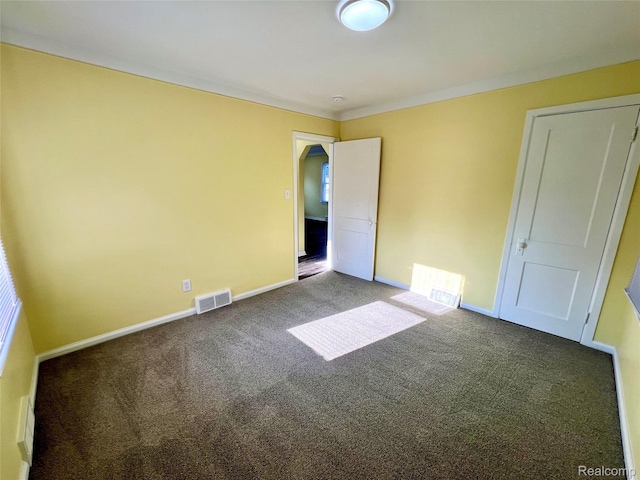 23657 Hill Ave, Warren, MI 48091 - unfurnished bedroom with carpet flooring and baseboards