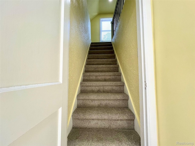 23657 Hill Ave, Warren, MI 48091 - stairway featuring a textured wall and carpet flooring