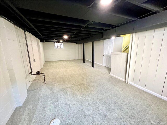 23657 Hill Ave, Warren, MI 48091 - basement featuring carpet flooring and concrete block wall