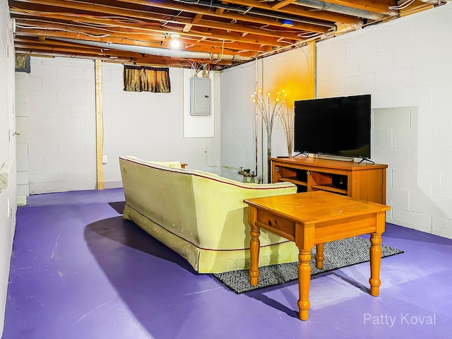 4164 Madison Ave SE, Grand Rapids, MI 49548 - living room with finished concrete floors and electric panel
