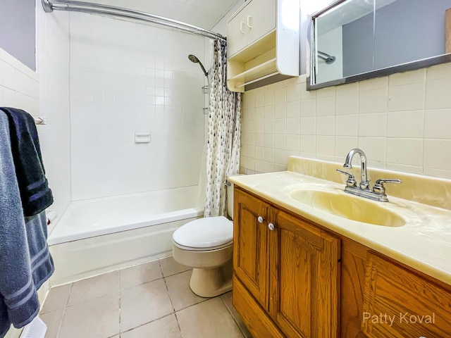 4164 Madison Ave SE, Grand Rapids, MI 49548 - full bathroom with vanity, shower / bath combo with shower curtain, tile walls, decorative backsplash, and tile patterned floors