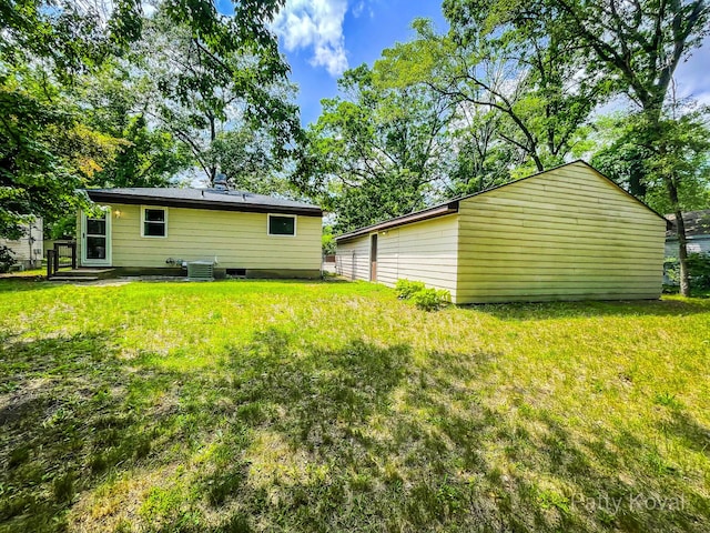 4164 Madison Ave SE, Grand Rapids, MI 49548 - back of property featuring a lawn