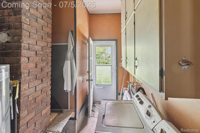 8025 Mayfair St, Taylor, MI 48180 - laundry area with independent washer and dryer, cabinet space, and brick wall