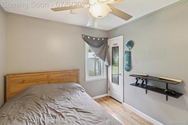 8025 Mayfair St, Taylor, MI 48180 - bedroom with wood finished floors and a ceiling fan