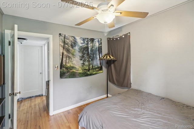 8025 Mayfair St, Taylor, MI 48180 - bedroom with wood finished floors and ceiling fan