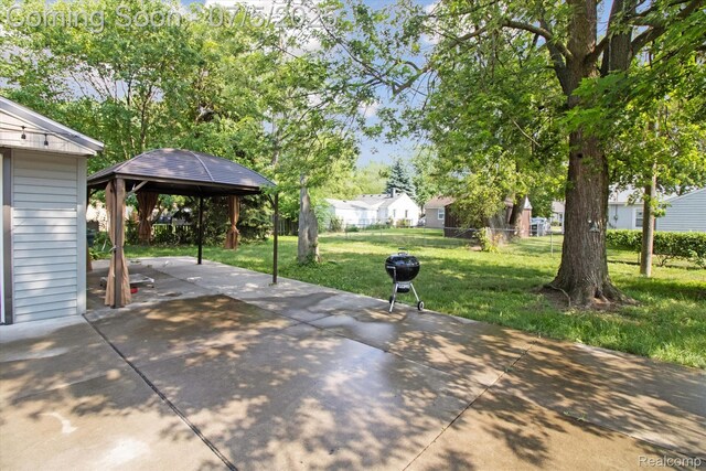 8025 Mayfair St, Taylor, MI 48180 - view of patio featuring a gazebo