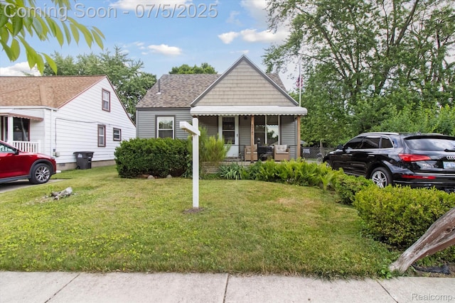 8025 Mayfair St, Taylor, MI 48180 - bungalow-style home with a front lawn and covered porch