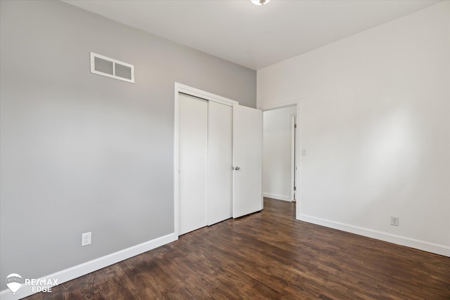3606 Pingree Ave, Flint, MI 48503 - unfurnished bedroom featuring wood finished floors and a closet