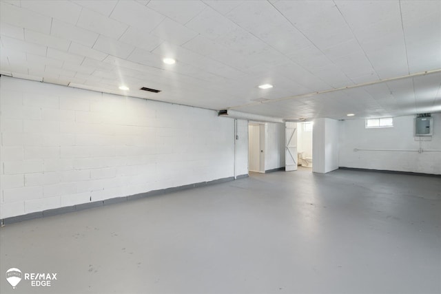 3606 Pingree Ave, Flint, MI 48503 - below grade area with electric panel, concrete block wall, and recessed lighting