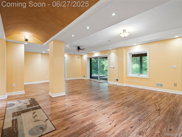 9767 Whisperwood Ln, Brighton, MI 48116 - unfurnished living room with light wood finished floors, ceiling fan, and recessed lighting