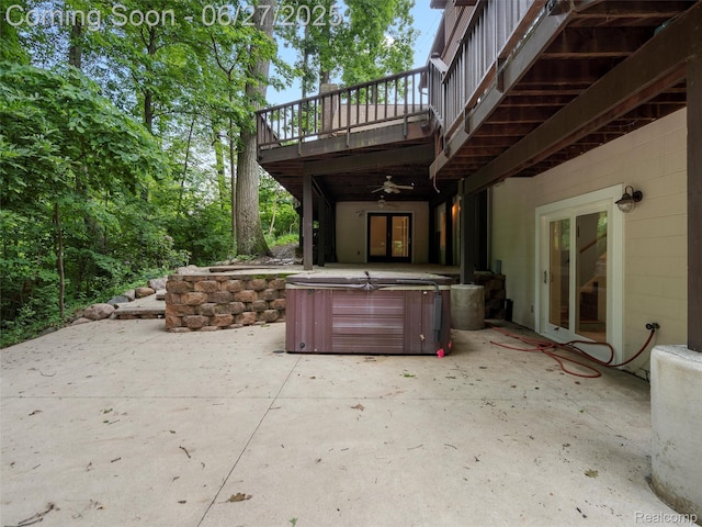 9767 Whisperwood Ln, Brighton, MI 48116 - patio / terrace featuring a hot tub, a patio, and a ceiling fan
