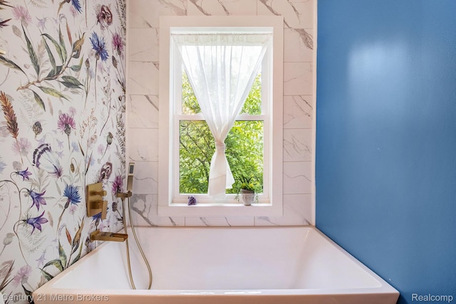 6428 W Court St, Flint, MI 48532 - bathroom featuring a freestanding tub