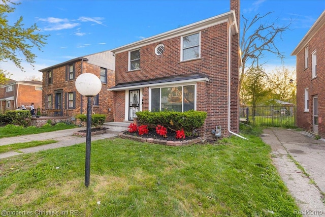 16573 Griggs St, Detroit, MI 48221 - view of front of house featuring brick siding and a chimney