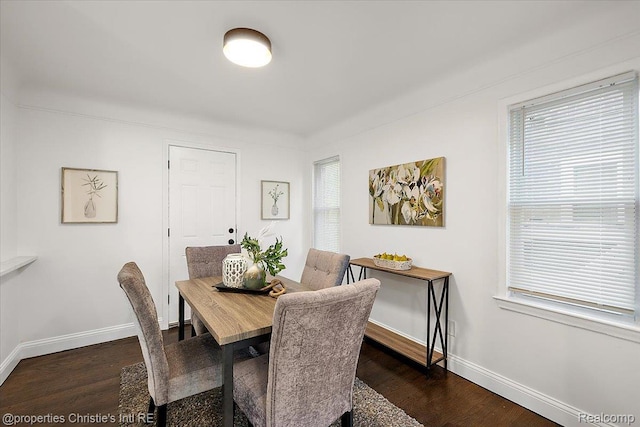 16573 Griggs St, Detroit, MI 48221 - dining space featuring dark wood-style flooring and baseboards