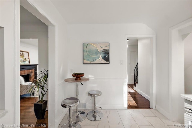 16573 Griggs St, Detroit, MI 48221 - hall featuring baseboards and light marble finish floors
