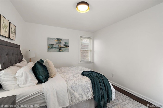 16573 Griggs St, Detroit, MI 48221 - bedroom featuring wood finished floors and baseboards