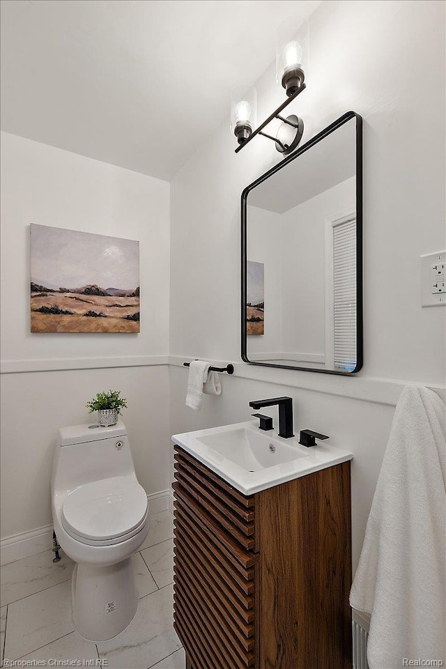 16573 Griggs St, Detroit, MI 48221 - bathroom featuring vanity and marble finish floors
