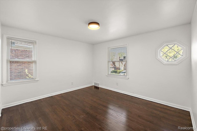 16573 Griggs St, Detroit, MI 48221 - unfurnished room featuring dark wood-style floors and baseboards