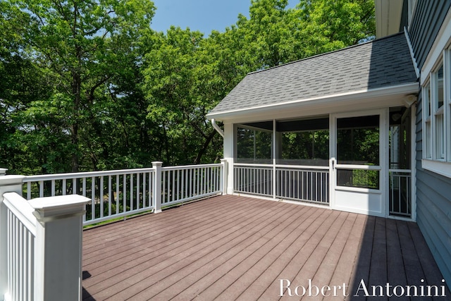 1977 Emerald Glen Ct NE, Ada, MI 49301 - wooden deck featuring a sunroom